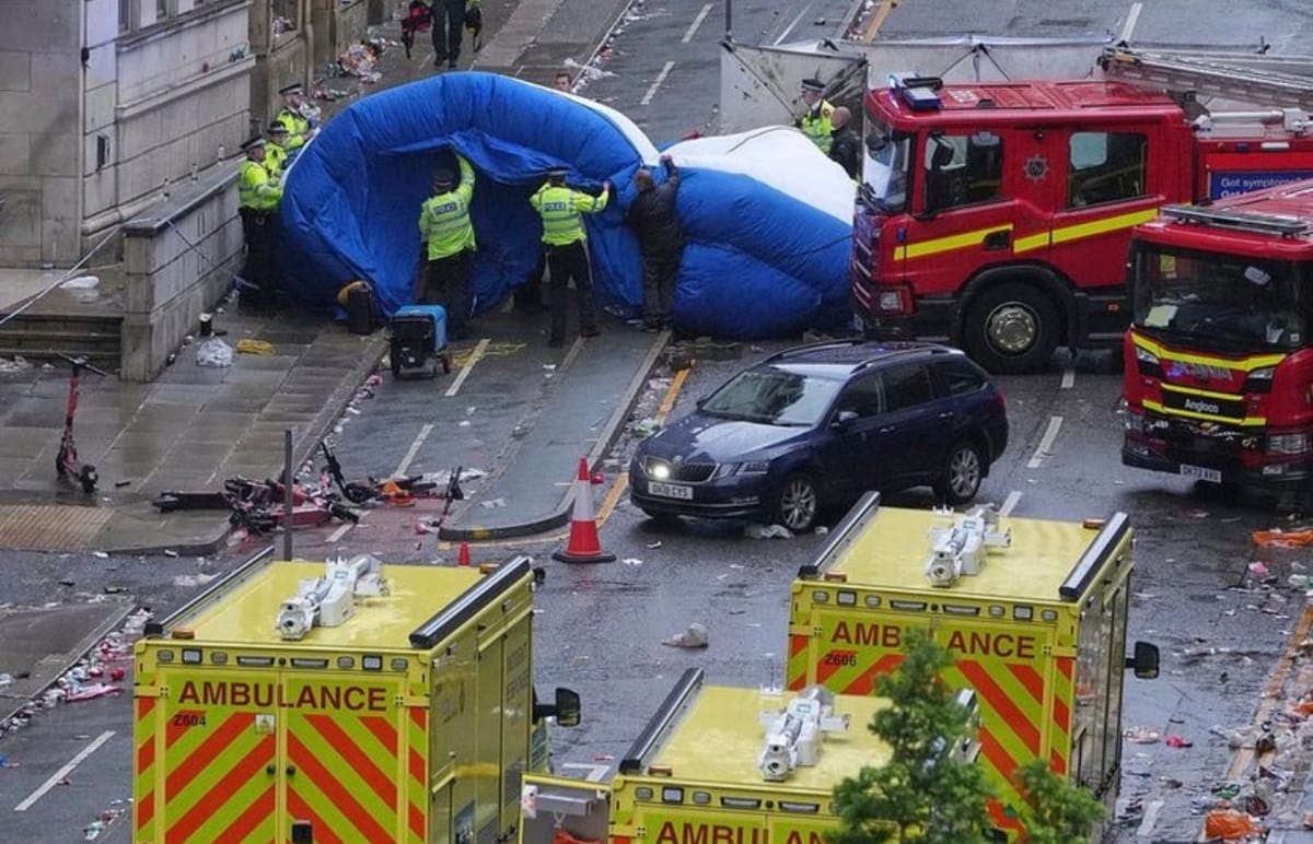 Liverpool Parade Tragedy: Car Plows Into Crowd, Dozens Injured